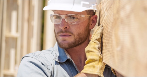 man holding board