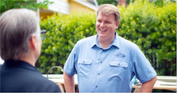 man smiling, happy with his purchase