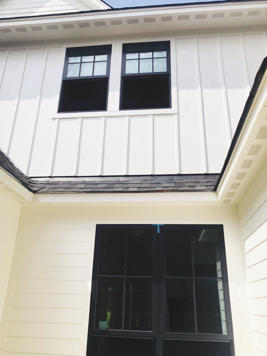 vented soffit white siding home